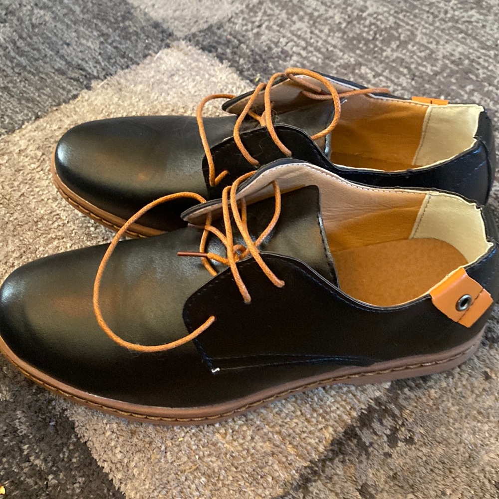New men dress shoe size 38 or 7.5 or 9. 3 inches black tie never worn